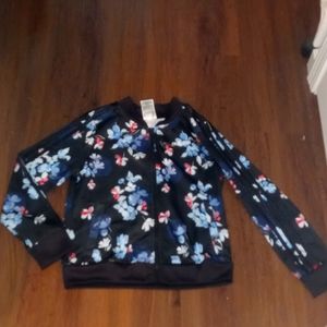 Brand new Adidas floral zip up jacket with 3 stripes down the arms.